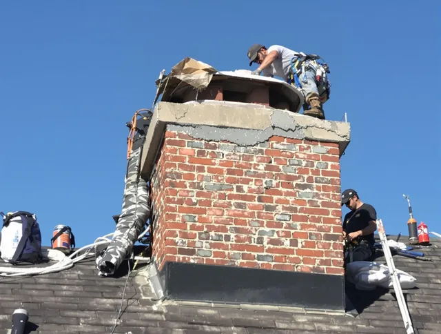 Medina Chimney Sweep installing a custom chimney crown in Medina, OH