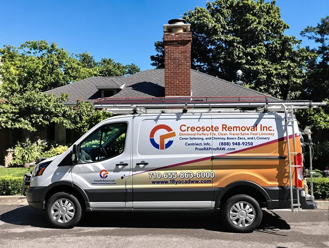 Medina Chimney Sweep technician removing creosote safely in Medina, OH